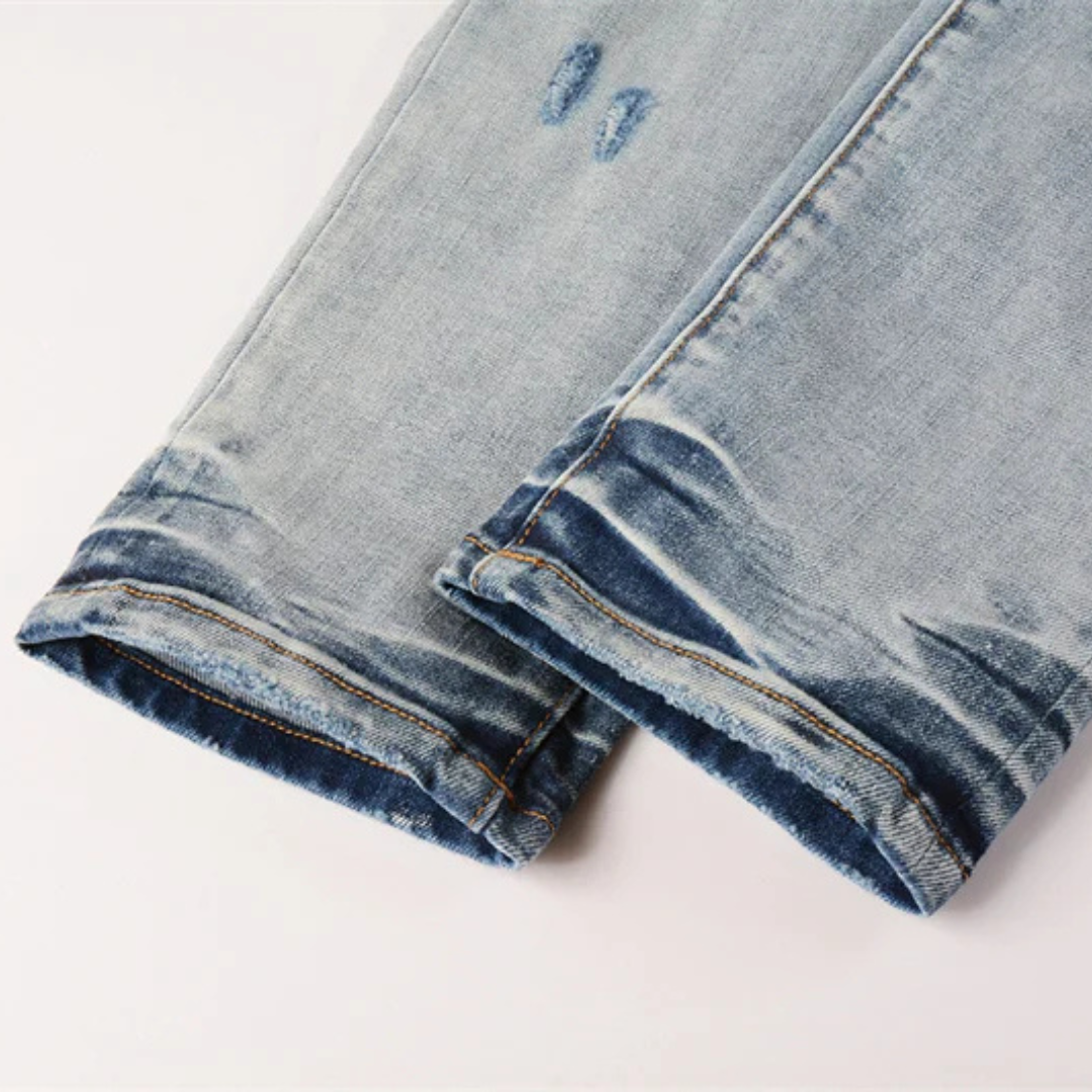 Ripped Knee Light Blue Jeans