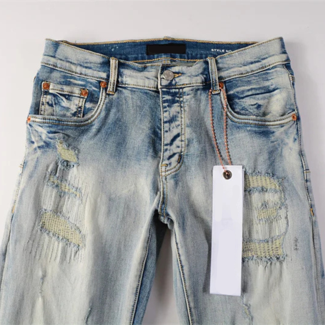 Ripped Knee Washed Light Blue Jeans