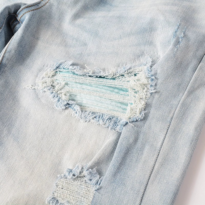 RIPPED JEANS WITH PATCHES - Light blue