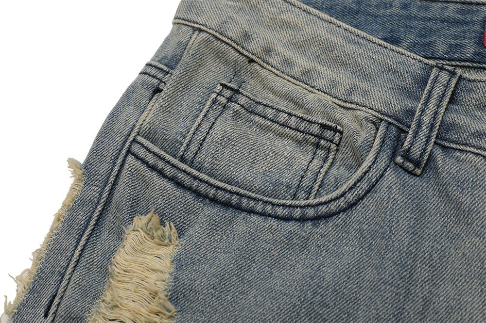 Distressed Flared Jeans