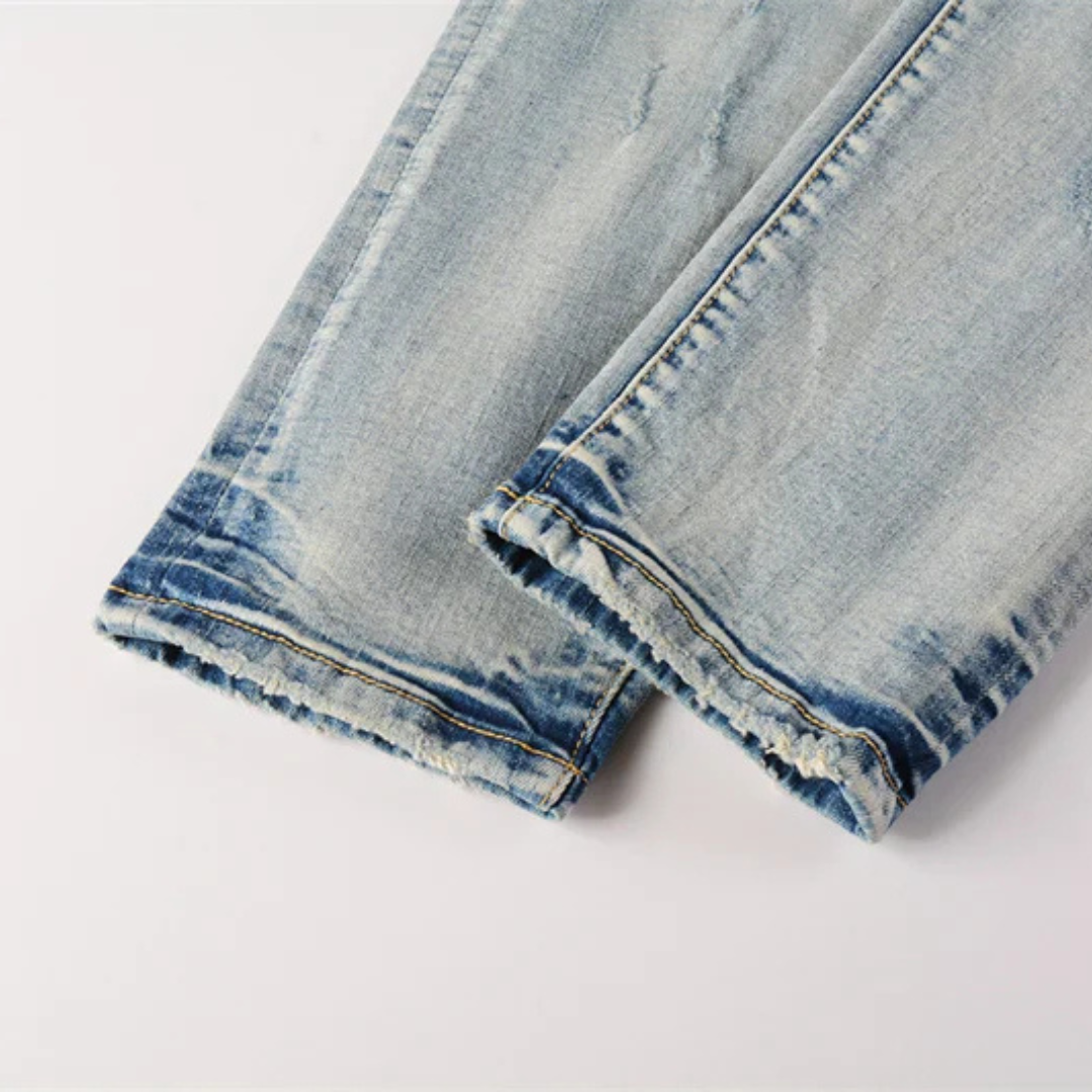 Ripped Knee Washed Light Blue Jeans