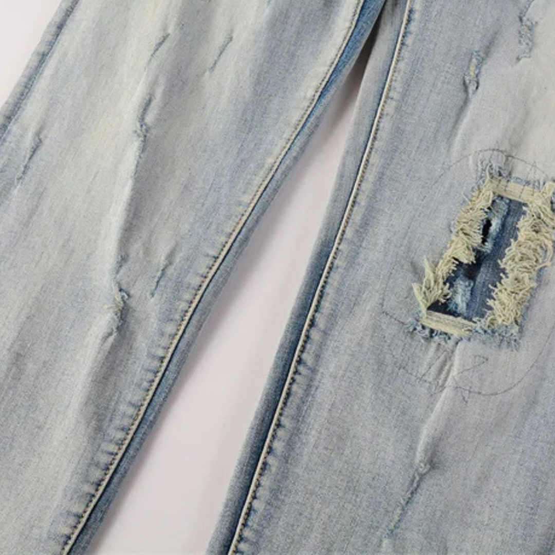 Ripped Knee Washed Light Blue Jeans